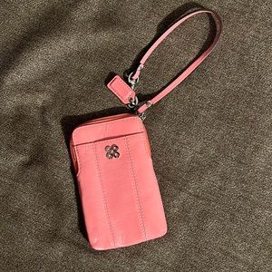 Coach pink colored mini wristlet.  Great condition.